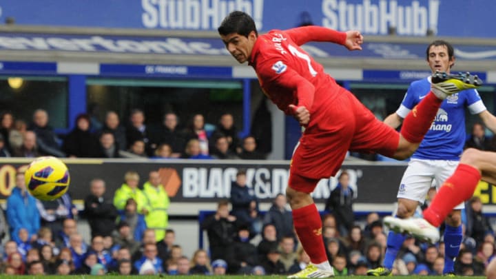 LIVERPOOL, ENGLAND - OCTOBER 28: Luis Suarez of Liverpool scores his team's second goal during the Barclays Premier League match between Everton and Liverpool at Goodison Park on October 28, 2012 in Liverpool, England. (Photo by Chris Brunskill/Getty Images)