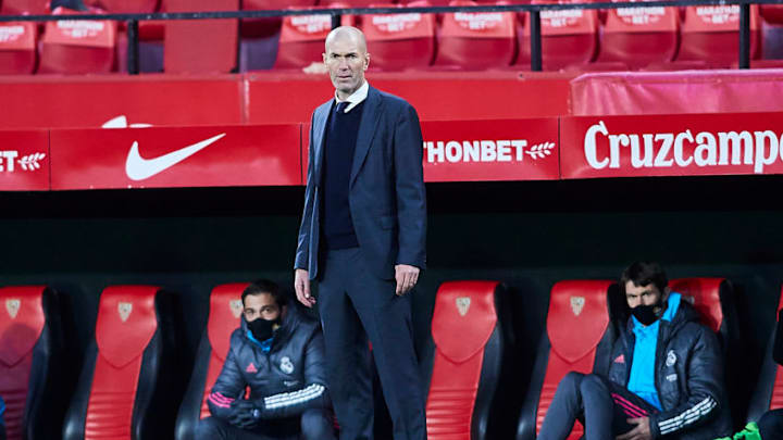 SEVILLE, SPAIN - DECEMBER 05: Zinedine Zidane, coach of Real Madrid looks on during the La Liga Santader match between Sevilla FC and Real Madrid at Estadio Ramon Sanchez Pizjuan on December 05, 2020 in Seville, Spain. (Photo by Fran Santiago/Getty Images)