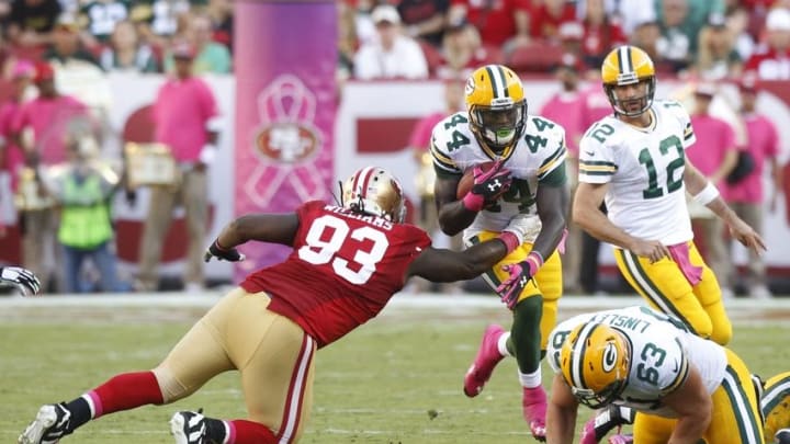 Oct 4, 2015; Santa Clara, CA, USA; Green Bay Packers running back James Starks (44) runs the ball next to San Francisco 49ers nose tackle Ian Williams (93) in the fourth quarter at Levi's Stadium. The Packers defeated the 49ers 17-3. Mandatory Credit: Cary Edmondson-USA TODAY Sports