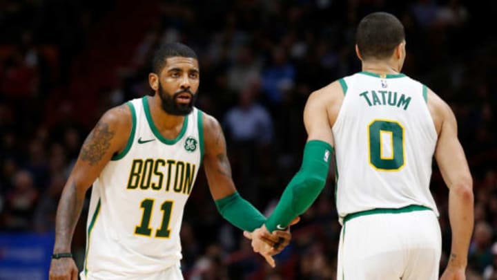 MIAMI, FL – JANUARY 10: Kyrie Irving #11 of the Boston Celtics celebrates with Jayson Tatum #0 against the Miami Heat at American Airlines Arena on January 10, 2019 in Miami, Florida. NOTE TO USER: User expressly acknowledges and agrees that, by downloading and or using this photograph, User is consenting to the terms and conditions of the Getty Images License Agreement. (Photo by Michael Reaves/Getty Images)
