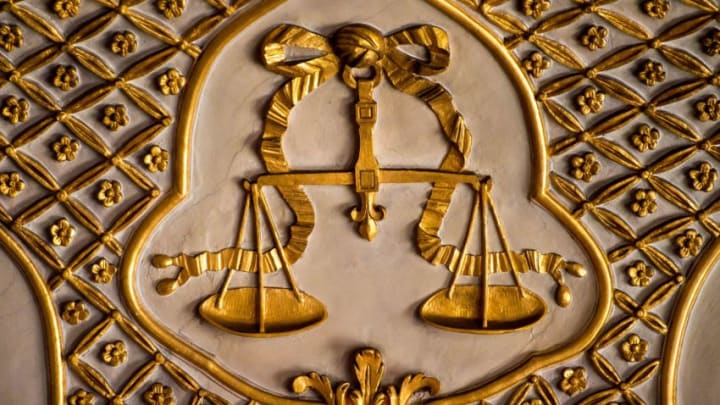 A picture shows balance scales symbolising justice at the courthouse of Douai in northern France on June 25, 2015. AFP PHOTO / PHILIPPE HUGUEN (Photo credit should read PHILIPPE HUGUEN/AFP/Getty Images)