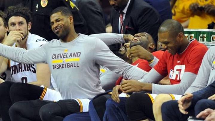 Jan 27, 2016; Cleveland, OH, USA; Cleveland Cavaliers center Tristan Thompson (13) and guard J.R. Smith (5) and forward LeBron James (23) and guard James Jones (1) joke around during the fourth quarter against the Phoenix Suns at Quicken Loans Arena. The Cavs won 115-93. Mandatory Credit: Ken Blaze-USA TODAY Sports