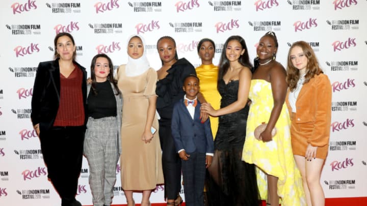 LONDON, ENGLAND - OCTOBER 11: (L-R) Sarah Gavron, Anastasia Dymitrow, Tawheda Begum, Bukky Bakray, D'angelou Osei Kissiedu, Kosar Ali, Shaneigha-Monik Greyson, Afi Okaidja and Ruby Stokes attend the "Rocks" UK Premiere during the 63rd BFI London Film Festival at the Odeon Luxe Leicester Square on October 11, 2019 in London, England. (Photo by Tristan Fewings/Getty Images for BFI)