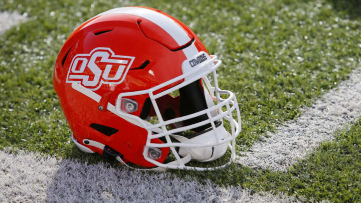 STILLWATER, OK - NOVEMBER 28: An Oklahoma State Cowboys helmet sits on the sideline before a game against the Texas Tech Red Raiders at Boone Pickens Stadium on November 28, 2020 in Stillwater, Oklahoma. OSU won 50-44. (Photo by Brian Bahr/Getty Images)