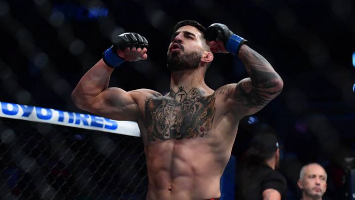 Jul 10, 2021; Las Vegas, Nevada, USA; Ilia Topuria celebrates his knockout victory against Ryan Hall during UFC 264 at T-Mobile Arena. Mandatory Credit: Gary A. Vasquez-USA TODAY Sports Jul 10, 2021; Las Vegas, Nevada, USA; Ilia Topuria celebrates his knockout victory against Ryan Hall during UFC 264 at T-Mobile Arena. Mandatory Credit: Gary A. Vasquez-USA TODAY Sports