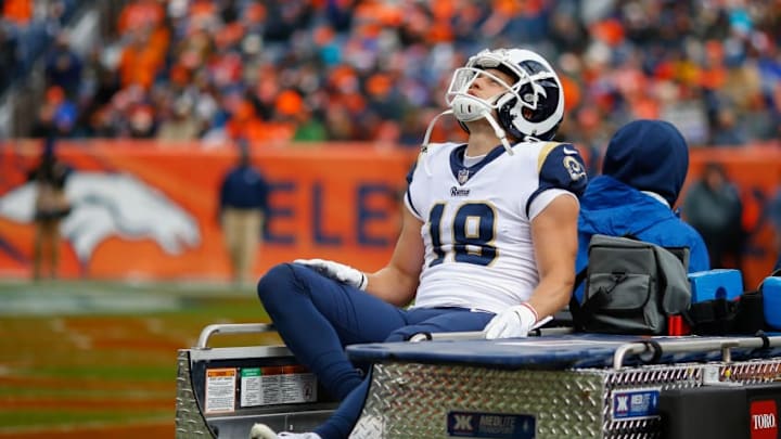 DENVER, CO - OCTOBER 14: wide receiver Cooper Kupp #18 of the Los Angeles Rams is carted off the field with a knee injury during the second quarter against the Denver Broncos at Broncos Stadium at Mile High on October 14, 2018 in Denver, Colorado. (Photo by Justin Edmonds/Getty Images) DENVER, CO - OCTOBER 14: wide receiver Cooper Kupp #18 of the Los Angeles Rams is carted off the field with a knee injury during the second quarter against the Denver Broncos at Broncos Stadium at Mile High on October 14, 2018 in Denver, Colorado. (Photo by Justin Edmonds/Getty Images)