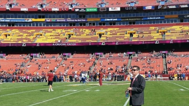 Oct 20, 2013; Landover, MD, USA; Washington Redskins owner Daniel Snyder on the field before the game against the Chicago Bears at FedEX Field. Mandatory Credit: Brad Mills-USA TODAY Sports