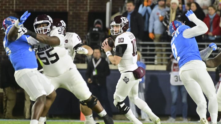 Nov 13, 2021; Oxford, Mississippi, USA; Texas A&M Aggies quarterback Zach Calzada (10) drops back to pass against the Mississippi Rebels during the first quarter at Vaught-Hemingway Stadium. Mandatory Credit: Matt Bush-USA TODAY Sports