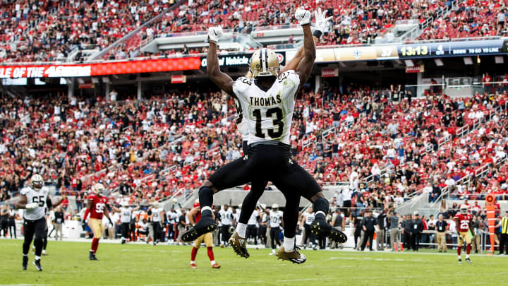 SANTA CLARA, CA – NOVEMBER 06: Wide receiver Michael Thomas #13 of the New Orleans Saints is congratulated by Willie Snead (back) after scoring a touchdown against the San Francisco 49ers during the fourth quarter at Levi’s Stadium on November 6, 2016 in Santa Clara, California. The New Orleans Saints defeated the San Francisco 49ers 41-23. (Photo by Jason O. Watson/Getty Images)