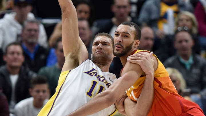 SALT LAKE CITY, UT - APRIL 03: Brook Lopez #11 of the Los Angeles Lakers and Rudy Gobert #27 of the Utah Jazz battle for position in the second half of a game at Vivint Smart Home Arena on April 3, 2018 in Salt Lake City, Utah. The Jazz beat the Lakers 117-110. NOTE TO USER: User expressly acknowledges and agrees that, by downloading and or using this photograph, User is consenting to the terms and conditions of the Getty Images License Agreement. (Photo by Gene Sweeney Jr./Getty Images)