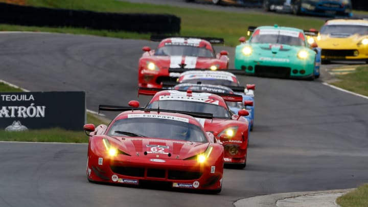 ALTON, VA - AUGUST 24: The #62 Ferrari of Giancarlo Fisichella and Pierre Kaffer races to victory in the IMSA Tudor Series GT race at Virginia International Raceway on August 24, 2014 in Alton, Virginia. (Photo by Brian Cleary/Getty Images)