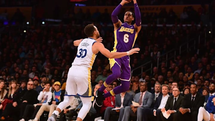 LOS ANGELES, CA - NOVEMBER 29: Jordan Clarkson #6 of the Los Angeles Lakers shoots a jumper over Stephen Curry #30 of the Golden State Warriors during a 127-123 Warriors win in overtime at Staples Center on November 29, 2017 in Los Angeles, California. (Photo by Harry How/Getty Images)