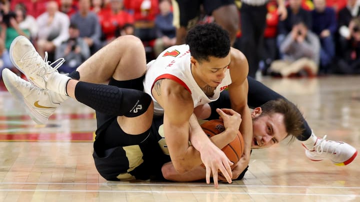 COLLEGE PARK, MARYLAND – JANUARY 18: Anthony Cowan Jr. #1 of the Maryland Terrapins fouls Sasha Stefanovic #55 of the Purdue Boilermakers (Photo by Rob Carr/Getty Images)