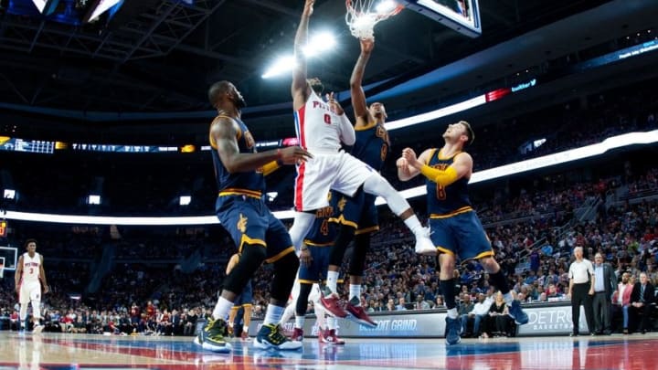 Apr 22, 2016; Auburn Hills, MI, USA; Detroit Pistons center Andre Drummond (0) goes to the basket as Cleveland Cavaliers forward LeBron James (23) forward Channing Frye (9) and guard Matthew Dellavedova (8) defend during the second quarter in game three of the first round of the NBA Playoffs at The Palace of Auburn Hills. Mandatory Credit: Tim Fuller-USA TODAY Sports