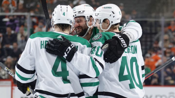 PHILADELPHIA, PENNSYLVANIA - JANUARY 24: (L-R) Miro Heiskanen #4, Alexander Radulov #47 and Jacob Peterson #40 of the Dallas Stars celebrate a goal by Peterson during the third period against the Philadelphia Flyers at Wells Fargo Center on January 24, 2022 in Philadelphia, Pennsylvania. (Photo by Tim Nwachukwu/Getty Images)