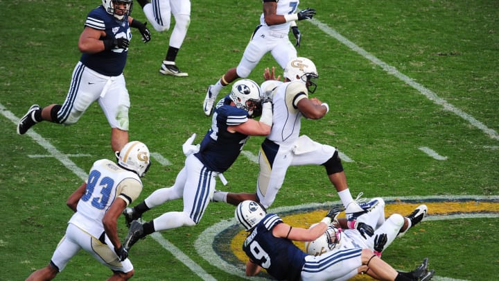 ATLANTA, GA – OCTOBER 27: Vad Lee #2 of the Georgia Tech Yellow Jackets is horse-collar tackled by Brandon Ogletree #44 of the BYU Cougars at Bobby Dodd Stadium on October 27, 2012 in Atlanta, Georgia. Ogletree was penalized for the tackle. (Photo by Scott Cunningham/Getty Images)