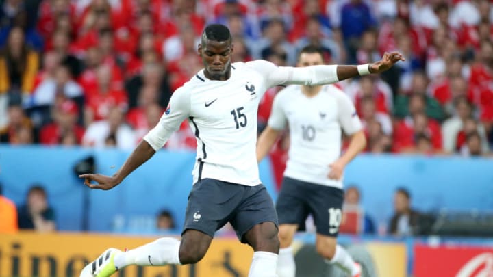 LILLE, FRANCE - JUNE 19: Paul Pogba of France in action during the UEFA EURO 2016 Group A match between Switzerland and France at Stade Pierre-Mauroy on June 19, 2016 in Lille, France. (Photo by Jean Catuffe/Getty Images)