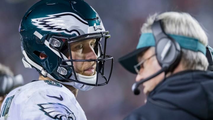 LANDOVER, MD - DECEMBER 30: Nick Foles #9 of the Philadelphia Eagles and head coach Doug Pederson discuss on the sidelines on against the Washington Redskins during the first half at FedExField on December 30, 2018 in Landover, Maryland. (Photo by Scott Taetsch/Getty Images)