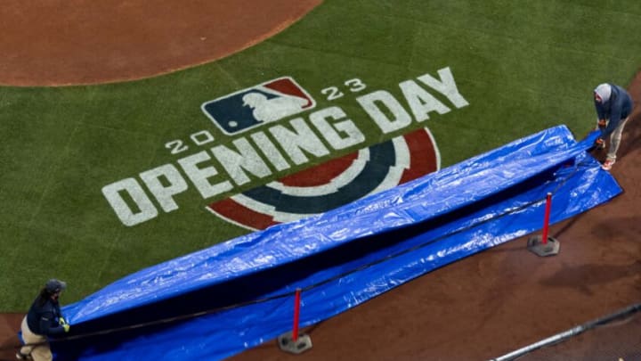 BOSTON, MA - MARCH 30: The tarp is removed to reveal the Opening Day logo before the 2023 Opening Day Game game between the Boston Red Sox and the Baltimore Orioles on March 30, 2023 at Fenway Park in Boston, Massachusetts. (Photo by Billie Weiss/Boston Red Sox/Getty Images)