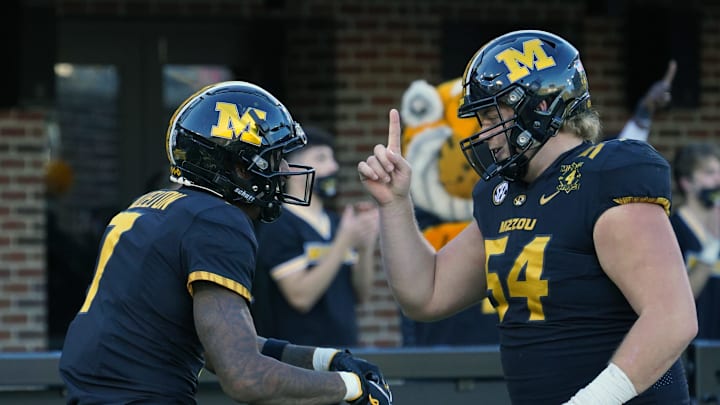 Nov 28, 2020; Columbia, Missouri, USA; Missouri Tigers wide receiver Damon Hazelton (7) celebrates with offensive lineman Luke Griffin (54) after scoring against the Vanderbilt Commodores during the second half at Faurot Field at Memorial Stadium. Mandatory Credit: Denny Medley-USA TODAY Sports