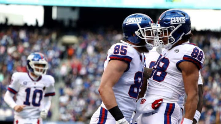 EAST RUTHERFORD, NEW JERSEY – DECEMBER 10: Rhett Ellison #85 of the New York Giants celebrates with Evan Engram #88 after scoring a touchdown against the Dallas Cowboys during the second quarter in the game at MetLife Stadium on December 10, 2017, in East Rutherford, New Jersey. (Photo by Elsa/Getty Images)