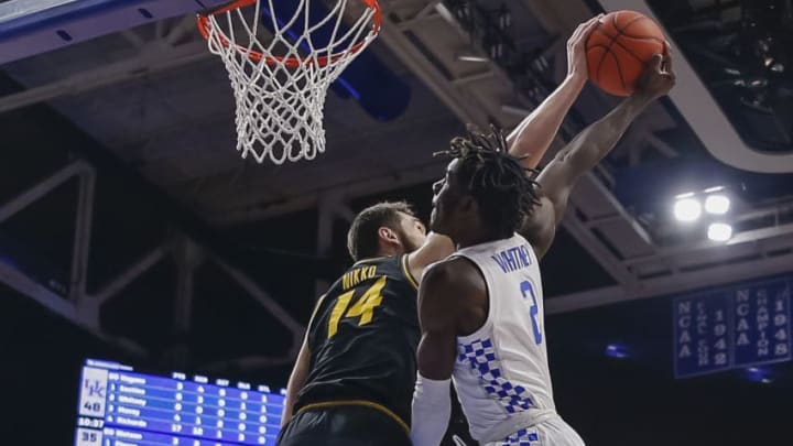LEXINGTON, KY - JANUARY 04: Kahlil Whitney #2 of the Kentucky Wildcats has is shot blocked by Reed Nikko #14 of the Missouri Tigers during the second half at Rupp Arena on January 4, 2020 in Lexington, Kentucky. (Photo by Michael Hickey/Getty Images)
