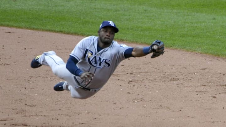 BALTIMORE, MD - JULY 29: Tampa Bay Rays shortstop Adeiny Hechavarria (11) dives and makes a catch in the eighth inning on a hard hit ground ball during the game between the Tampa Bay Rays and the Baltimore Orioles on July 29, 2018, at Orioles Park at Camden Yards in Baltimore, MD. The Baltimore Orioles defeated the Tampa Bay Rays, 11-5. (Photo by Mark Goldman/Icon Sportswire via Getty Images)