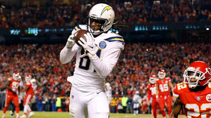 KANSAS CITY, MISSOURI - DECEMBER 13: Wide receiver Mike Williams #81 of the Los Angeles Chargers catches a pass for a touchdown as defensive back Orlando Scandrick #22 of the Kansas City Chiefs defends during the 4th quarter of the game at Arrowhead Stadium on December 13, 2018 in Kansas City, Missouri. (Photo by David Eulitt/Getty Images)