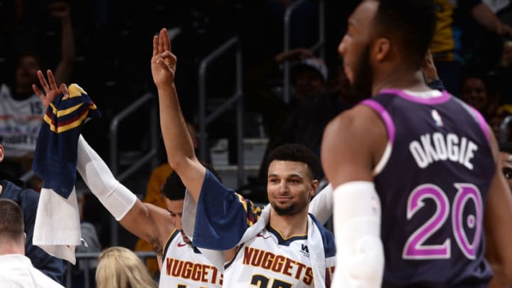 DENVER, CO - MARCH 12: Jamal Murray #27 of the Denver Nuggets reacts to a play during the game against the Minnesota Timberwolves on March 12, 2019 at the Pepsi Center in Denver, Colorado. NOTE TO USER: User expressly acknowledges and agrees that, by downloading and/or using this photograph, user is consenting to the terms and conditions of the Getty Images License Agreement. Mandatory Copyright Notice: Copyright 2019 NBAE (Photo by Bart Young/NBAE via Getty Images)