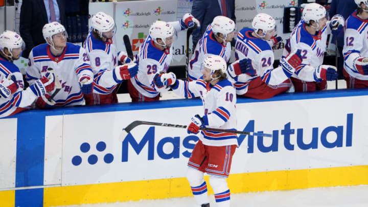 TORONTO, ONTARIO - AUGUST 03: Artemi Panarin #10 of the New York Rangers celebrates with teammates after scoring a goal against the Carolina Hurricanes in Game Two of the Eastern Conference Qualification Round prior to the 2020 NHL Stanley Cup Playoffs at Scotiabank Arena on August 3, 2020 in Toronto, Ontario, Canada. (Photo by Andre Ringuette/Freestyle Photo/Getty Images)