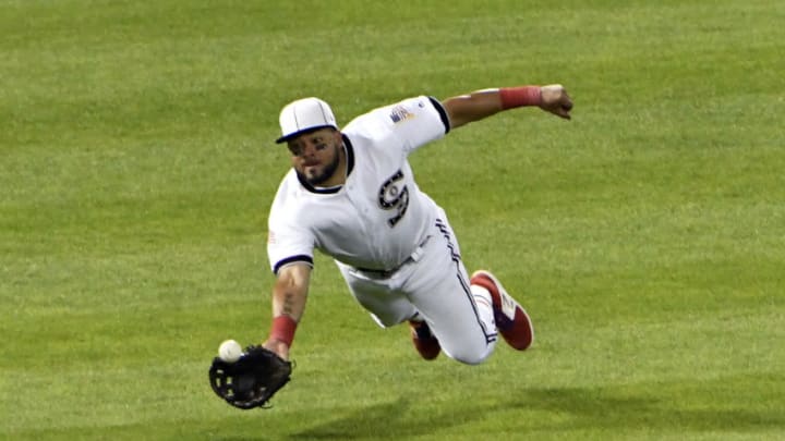 CHICAGO, IL - JULY 29: Melky Cabrera #53 of the Chicago White Sox tries to make a catch on a hit by Francisco Lindor #12 of the Cleveland Indians during the eighth inning on July 29, 2017 at Guaranteed Rate Field in Chicago, Illinois. (Photo by David Banks/Getty Images)