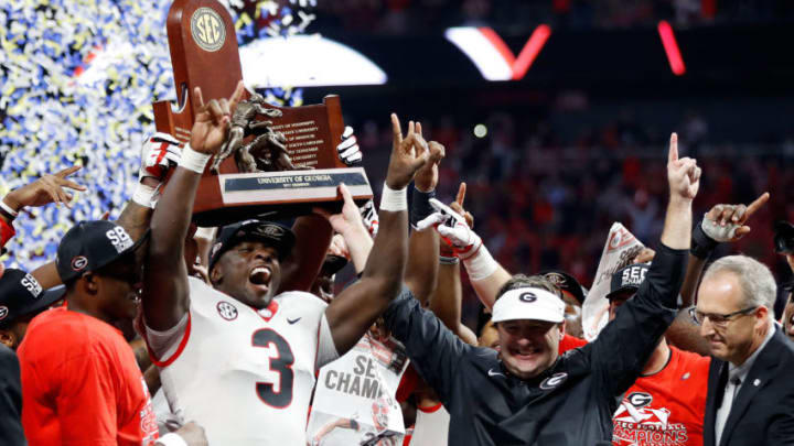 Head coach Kirby Smart of the Georgia Bulldogs with Roquan Smith (Photo by Jamie Squire/Getty Images)