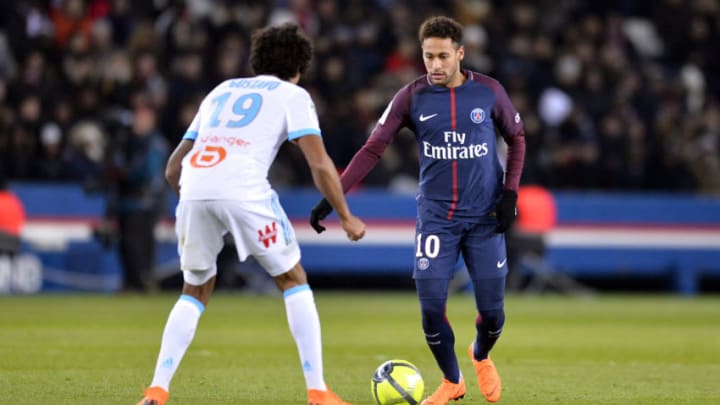 PARIS, FRANCE - FEBRUARY 25: Neymar Jr of Paris Saint-Germain runs with the ball during the Ligue 1 match between Paris Saint Germain and Olympique Marseille February 25, 2018 in Paris, France. (Photo by Aurelien Meunier/Getty Images)