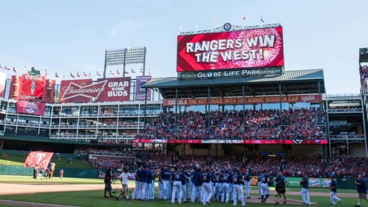 Oct 4, 2015; Arlington, TX, USA; The Texas Rangers celebrate their win over the Los Angeles Angels at Globe Life Park in Arlington. The Texas Rangers defeat the Angels 9-2 and clinch the American League West division. Mandatory Credit: Jerome Miron-USA TODAY Sports