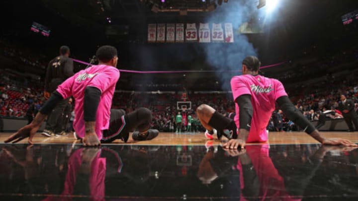 MIAMI, FL – JANUARY 10: James Johnson #16 and Udonis Haslem #40 of the Miami Heat stretch on the court before the game against the Boston Celtics on January 10, 2019 at American Airlines Arena in Miami, Florida. NOTE TO USER: User expressly acknowledges and agrees that, by downloading and or using this Photograph, user is consenting to the terms and conditions of the Getty Images License Agreement. Mandatory Copyright Notice: Copyright 2019 NBAE (Photo by Issac Baldizon/NBAE via Getty Images)