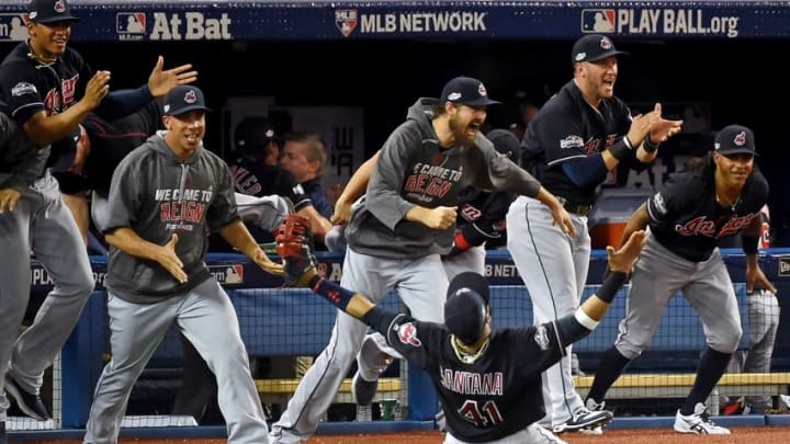 Oct 19, 2016; Toronto, Ontario, CAN; Cleveland Indians first baseman Carlos Santana (41) celebrates after making the final catch to beat the Toronto Blue Jays in game five of the 2016 ALCS playoff baseball series at Rogers Centre. Mandatory Credit: Dan Hamilton-USA TODAY Sports