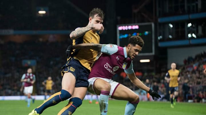 BIRMINGHAM, ENGLAND- FEBRUARY 28: Andre Green of Aston Villa and Aden Flint of Bristol City in action during the Sky Bet Championship match between Aston Villa and Bristol City at Villa Park on February 28, 2017 in Birmingham, England. (Photo by Nathan Stirk/Getty Images)
