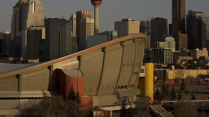 CALGARY, ALBERTA, CANADA - 2010: New condominium highrise apartment buildings and the Calgary Tower (center) are seen behind the Saddledome Arena in this 2010 Calgary, Canada, spring morning cityscape photo. (Photo by George Rose/Getty Images)