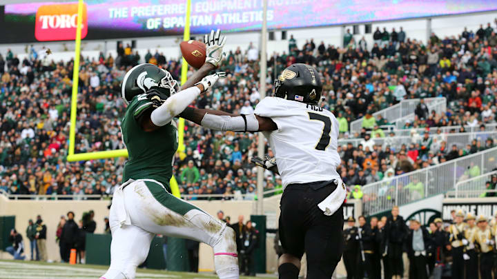 EAST LANSING, MI – OCTOBER 27: Justin Layne #2 of the Michigan State Spartans defends a pass intended for Isaac Zico #7 of the Purdue Boilermaker in the fourth quarter at Spartan Stadium on October 27, 2018 in East Lansing, Michigan. (Photo by Rey Del Rio/Getty Images)