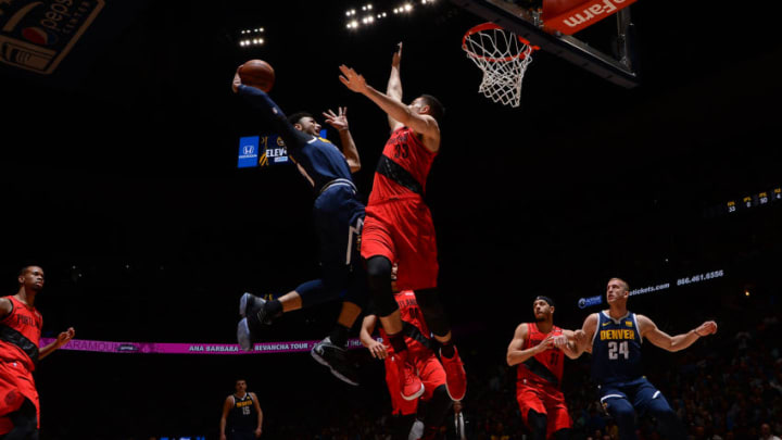 DENVER, CO - MAY 12: Jamal Murray #27 of the Denver Nuggets drives to the basket for dunk against the Portland Trail Blazers during Game Seven of the Western Conference Semifinals of the 2019 NBA Playoffs on May 12, 2019 at the Pepsi Center in Denver, Colorado. NOTE TO USER: User expressly acknowledges and agrees that, by downloading and/or using this Photograph, user is consenting to the terms and conditions of the Getty Images License Agreement. Mandatory Copyright Notice: Copyright 2019 NBAE (Photo by Bart Young/NBAE via Getty Images)