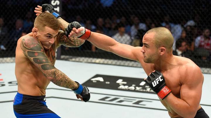 DALLAS, TX - MAY 13: (R-L) Eddie Alvarez punches Dustin Poirier in their lightweight fight during the UFC 211 event at the American Airlines Center on May 13, 2017 in Dallas, Texas. (Photo by Josh Hedges/Zuffa LLC/Zuffa LLC via Getty Images)