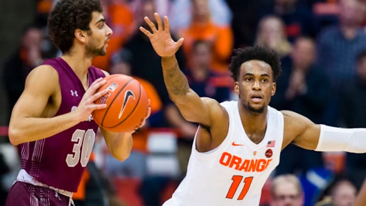 SYRACUSE, NY - NOVEMBER 21: Oshae Brissett #11 of the Syracuse Orange defends against Francisco Amiel #30 of the Colgate Raiders during the second half at the Carrier Dome on November 21, 2018 in Syracuse, New York. (Photo by Brett Carlsen/Getty Images)
