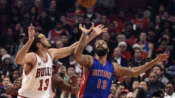 Dec 18, 2015; Chicago, IL, USA; Chicago Bulls center Joakim Noah (13) and Detroit Pistons forward Marcus Morris (13) go for the ball during the first half at the United Center. Mandatory Credit: David Banks-USA TODAY Sports