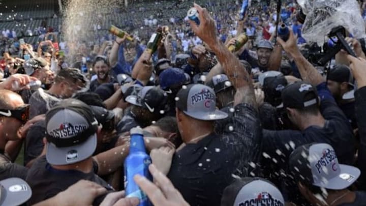 Sep 26, 2015; Chicago, IL, USA; Chicago Cubs players celebrate clinching their 2015 post season appearance after their game against the Pittsburgh Pirates at Wrigley Field. Mandatory Credit: Matt Marton-USA TODAY Sports