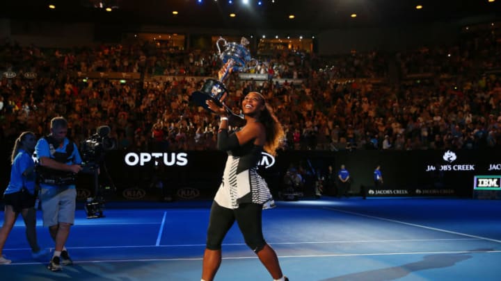 MELBOURNE, AUSTRALIA - JANUARY 28: Serena Williams waves to the crowd as she leaves the court with the Daphne Akhurst Trophy after winning the Women's Singles Final against Venus Williams of the United States on day 13 of the 2017 Australian Open at Melbourne Park on January 28, 2017 in Melbourne, Australia. (Photo by Scott Barbour/Getty Images)