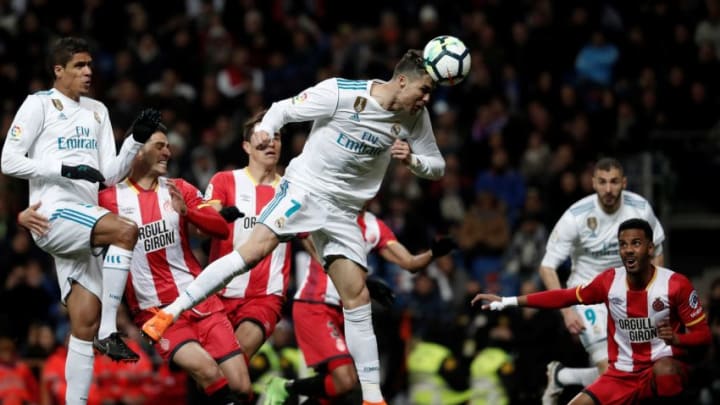 MADRID, SPAIN – MARCH 18: Cristiano Ronaldo of Real Madrid (C) in action during the La Liga soccer match between Real Madrid and Girona at Santiago Bernabeu Stadium in Madrid, Spain on March 18, 2018.(Photo by Burak Akbulut/Anadolu Agency/Getty Images)