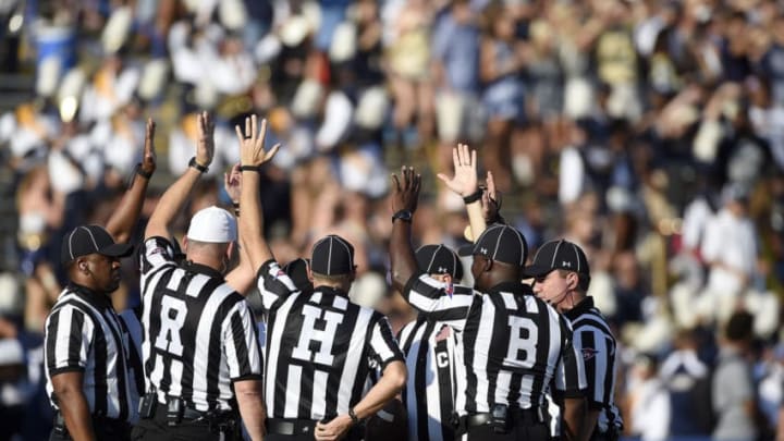 STATESBORO, GA - SEPTEMBER 3: Referees meet at midfield before the Georgia Southern Eagles take on the Savannah State Tigers on September 3, 2016 at Paulson Stadium in Statesboro, Georgia. (Photo by Todd Bennett/Getty Images)