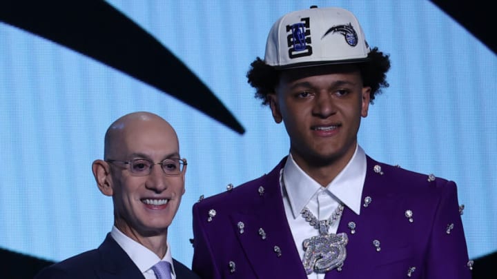 NEW YORK, NY, USA - JUNE 23: Paolo Banchero poses for a photo with NBA Commissioner, Adam Silver (L) after being selected number one overall by the Orlando Magic during the 2022 NBA Draft on June 23, 2022 at Barclays Center in Brooklyn, New York, United States. (Photo by Tayfun Coskun/Anadolu Agency via Getty Images)