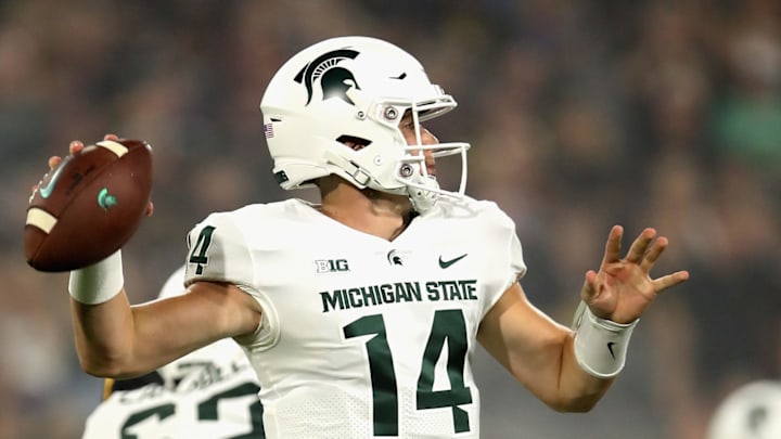 TEMPE, AZ – SEPTEMBER 08: Quarterback Brian Lewerke #14 of the Michigan State Spartans drops back to pass during the first half of the college football game against the Arizona State Sun Devils at Sun Devil Stadium on September 8, 2018 in Tempe, Arizona. (Photo by Christian Petersen/Getty Images)