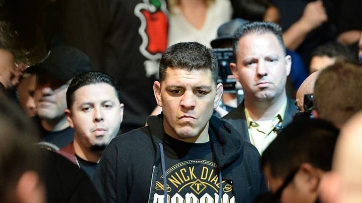 Jan 31, 2015; Las Vegas, NV, USA; Nick Diaz (blue gloves) walks to the ring before a middleweight fight against Anderson Silva (not pictured) during UFC 183 at the MGM Grand Garden Arena. Mandatory Credit: Jayne Kamin-Oncea-USA TODAY Sports